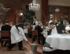 Waiter sprays vomit into bucket