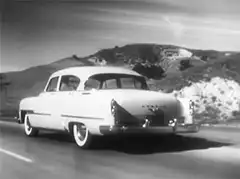 DeSoto car driving on road