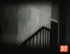 Silhouette figure on a staircase