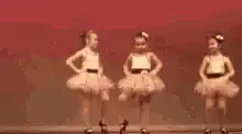 Toddler ballet dancers on stage