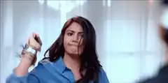 Woman throws shoe at someone