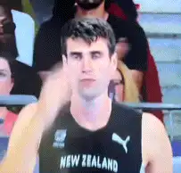 New Zealand high jumper prepares and jumps