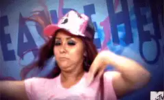 Woman in pink hat dancing
