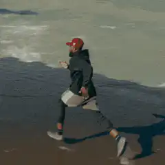 Man running on beach