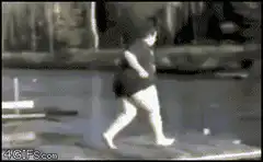 Woman slips off dock into water