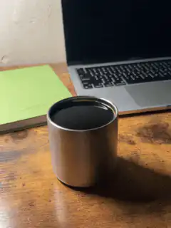 steam rising from coffee cup