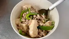 bowl of tofu and minced meat with peppers