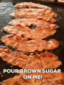 bacon sizzling on griddle