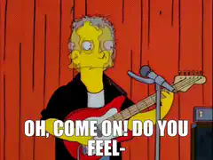 Reverend Lovejoy playing guitar on stage