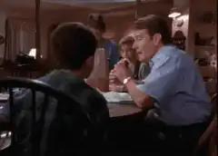 Dad turns off the lights at dinner