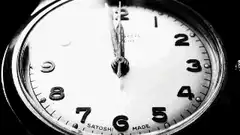 Man checking watch with clock overlay