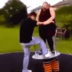 Couple falls off spring rider