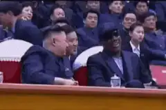 Kim Jong Un and Snoop Dogg laughing