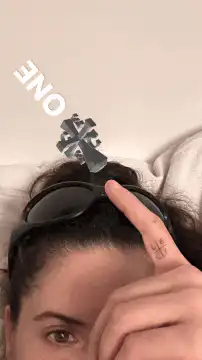 Ankh symbol spinning on head