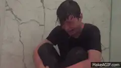 Man crying in shower
