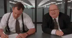Two men in an office talking