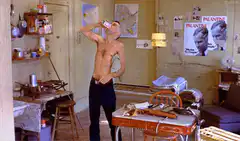 Travis Bickle drinking from a can