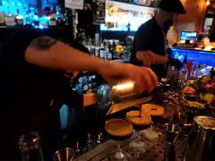 Bartender pouring espresso martini