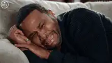 Tyler Perry crying in bed