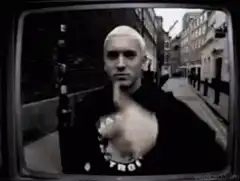 Eminem pointing at the screen