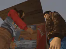 Two men fist bumping