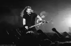 Metallica James Hetfield headbanging on stage
