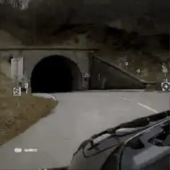 car driving into a tunnel