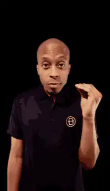 Man doing shhh gesture
