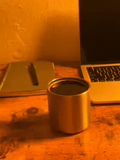 metal cup on desk