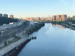 City river and highway at sunset