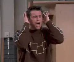 Joey screaming with hands on head