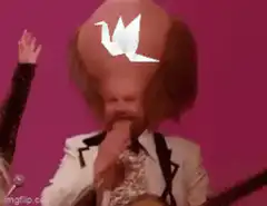 Baby with origami head playing guitar