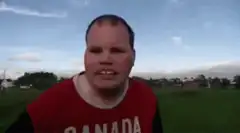 Man in Canada shirt smiling