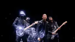 Daft Punk and Pharrell Williams perform