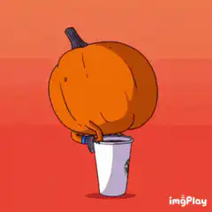 Pumpkin head drinking from cup