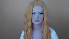 woman with devil horns smiling