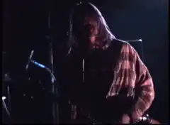 musician headbanging on stage