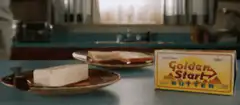 Man eats a block of butter