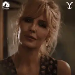 Kylie Minogue smirking