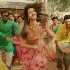 Man in pink dress dancing