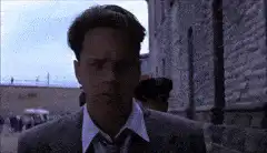 Andy Dufresne looks up at the prison wall