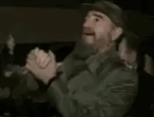 Fidel Castro saluting