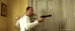 Jean Reno pointing gun