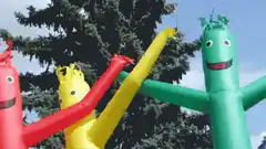 Colorful inflatable tube men dancing