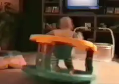 Baby in walker spinning around