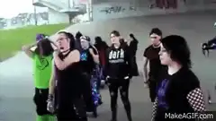 Group of goths dancing outdoors