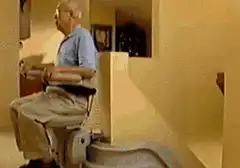 Old man on stairlift