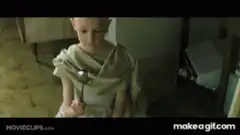 The Kid holds a ladle showing Neo's reflection