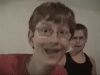 Two boys dancing and making faces