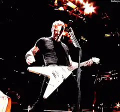 James Hetfield playing guitar with fire